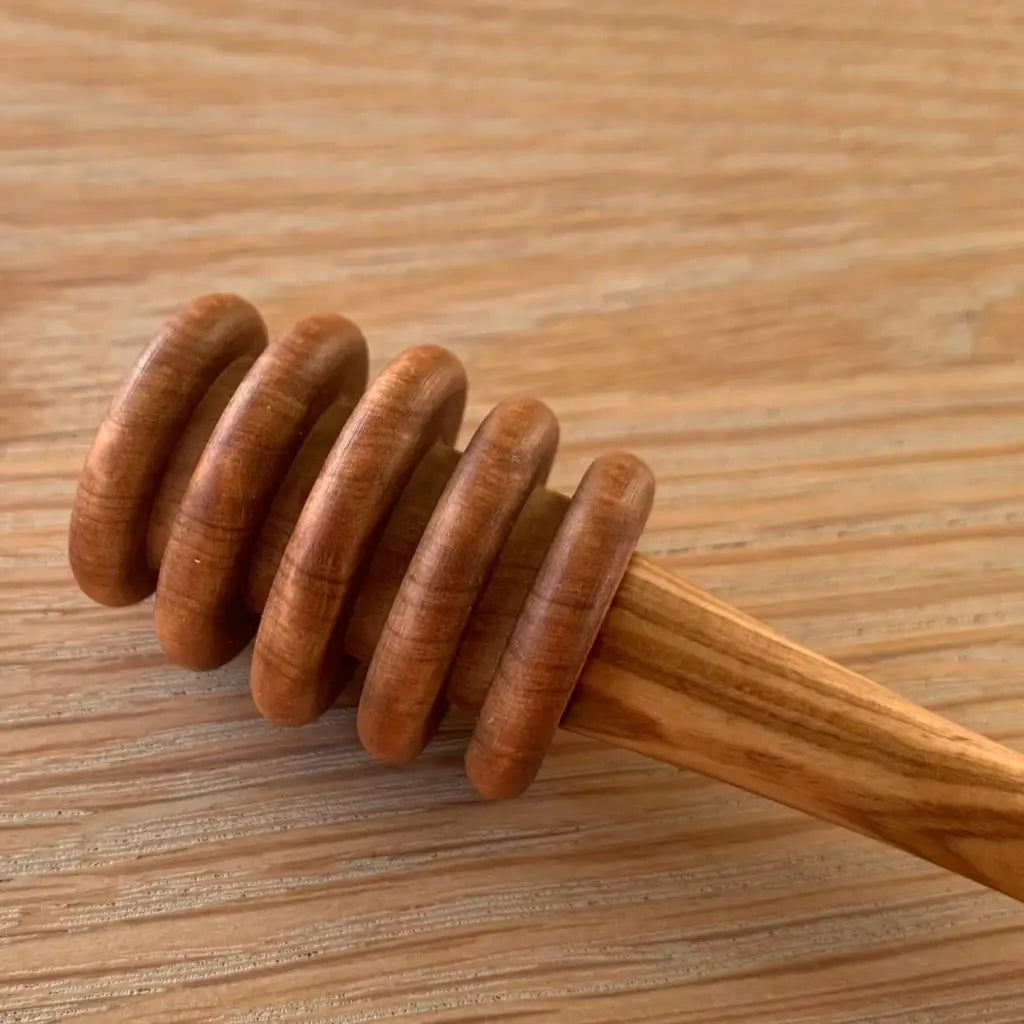 close up on honey spoon