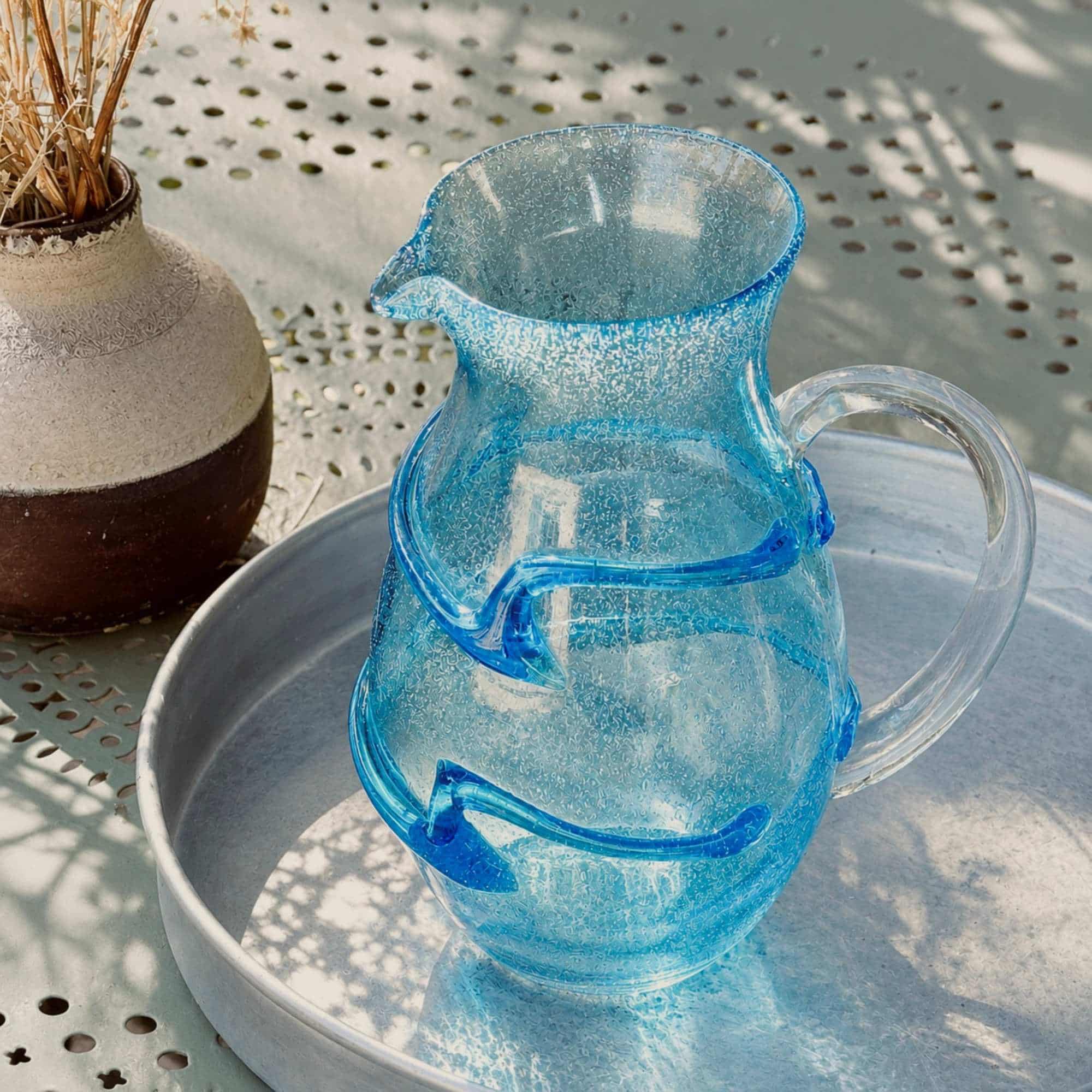 Vintage blue Biot bubble glass jug with clear handle and applied blue trails