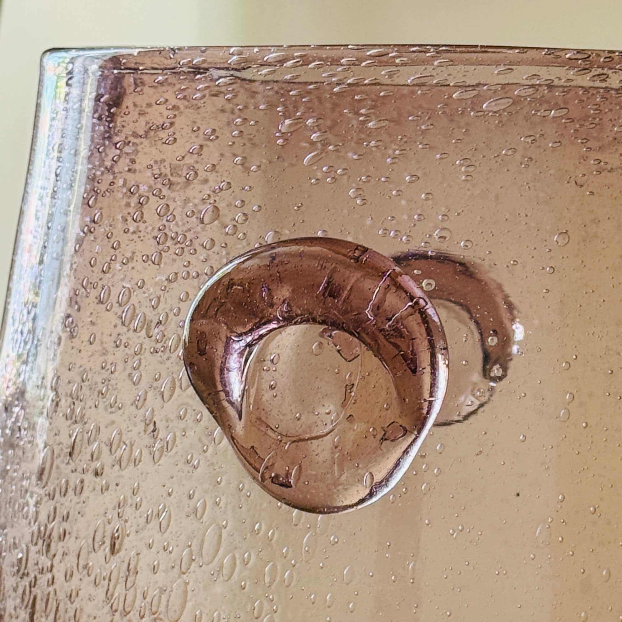 Large handmade Biot bubble glass vessel suitable for use as a vase