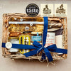 A Provençal apéro box filled with artisan spreads, terrines and crackers, paired with a southern French wine.