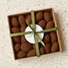 Box of chocolate dusted almonds from France