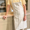Wearing  French apron made of cotton