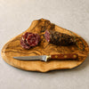 Kitchen knife made in France with serrated blade and rosewood handle