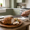 Slicing through a chicken with Le Thiers kitchen knife
