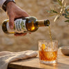 Pouring a glass of French Vermouth de Forcalquier