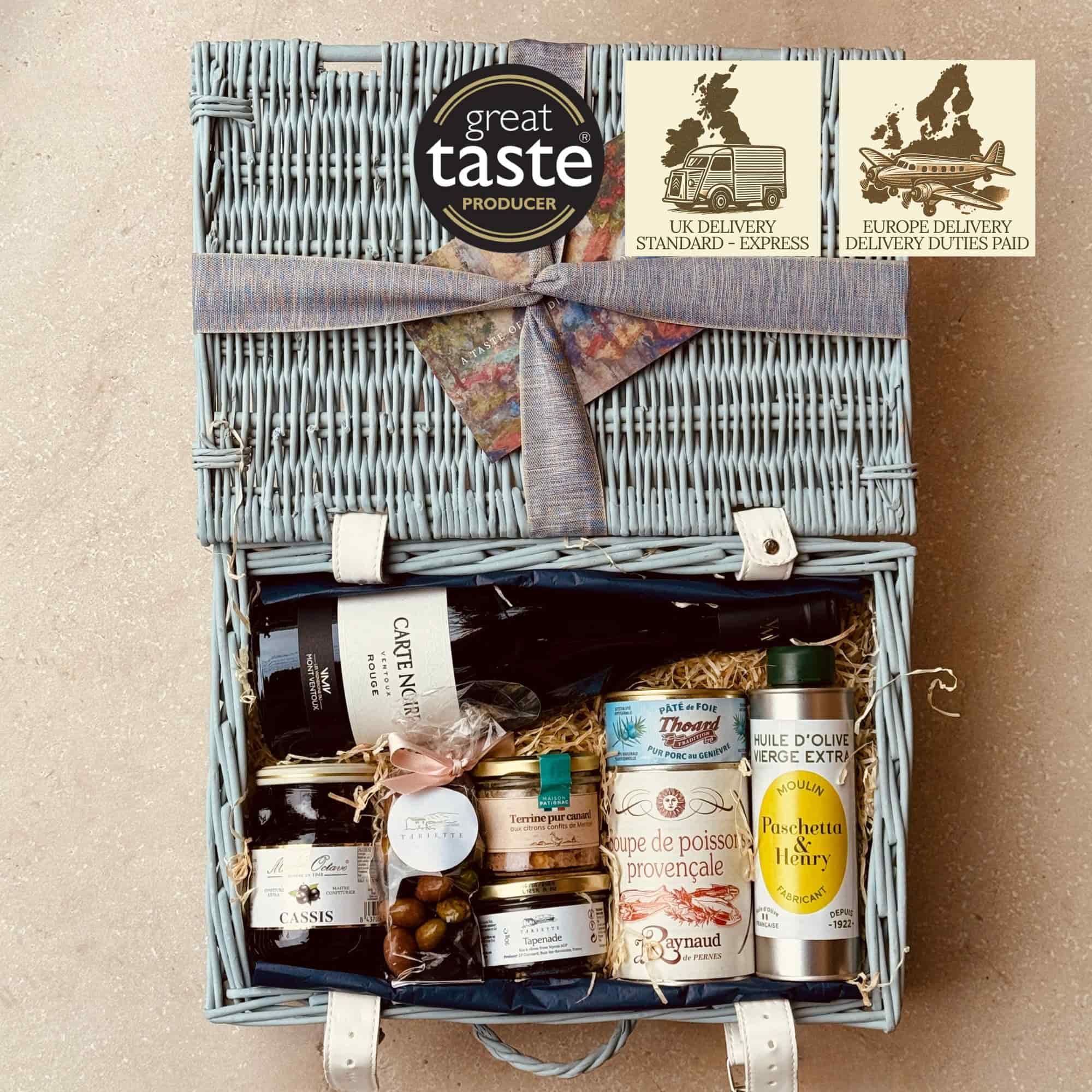 Hamper Gaspard is a refined gourmet gift from Provence, featuring savoury favourites, chocolate almonds, blackcurrant jam, and a bottle of Carte Noire Ventoux red.