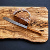 Laguiole bread knife with sharp serrated blade and olive wood handle