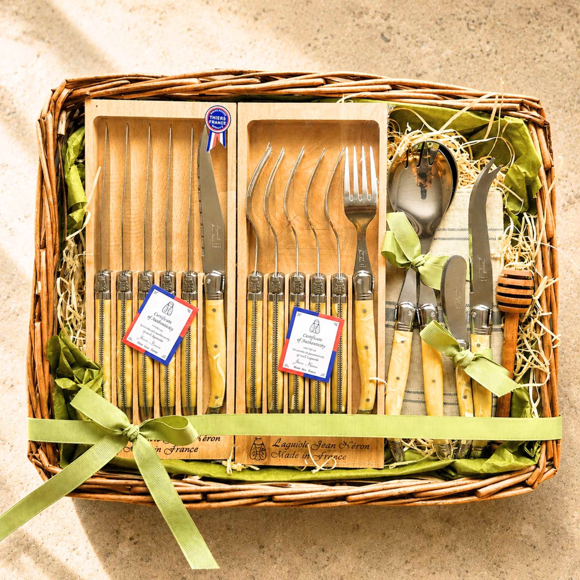 Laguiole cutlery box in white horn colour with knives, forks, salad servers and more