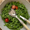 Laguiole salad servers with white horn handle made of plastic