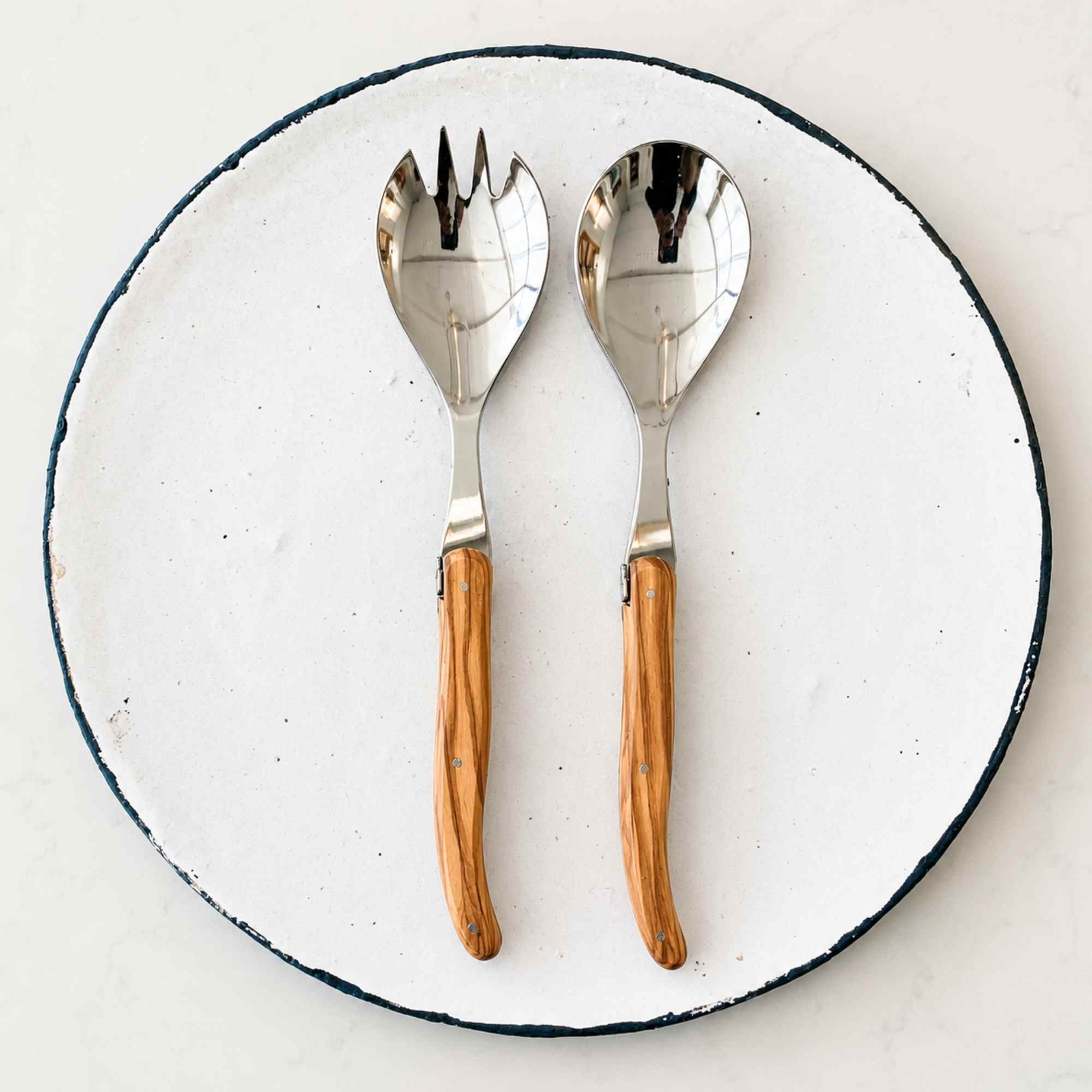 Laguiole salad servers made in France, with olive wood handle