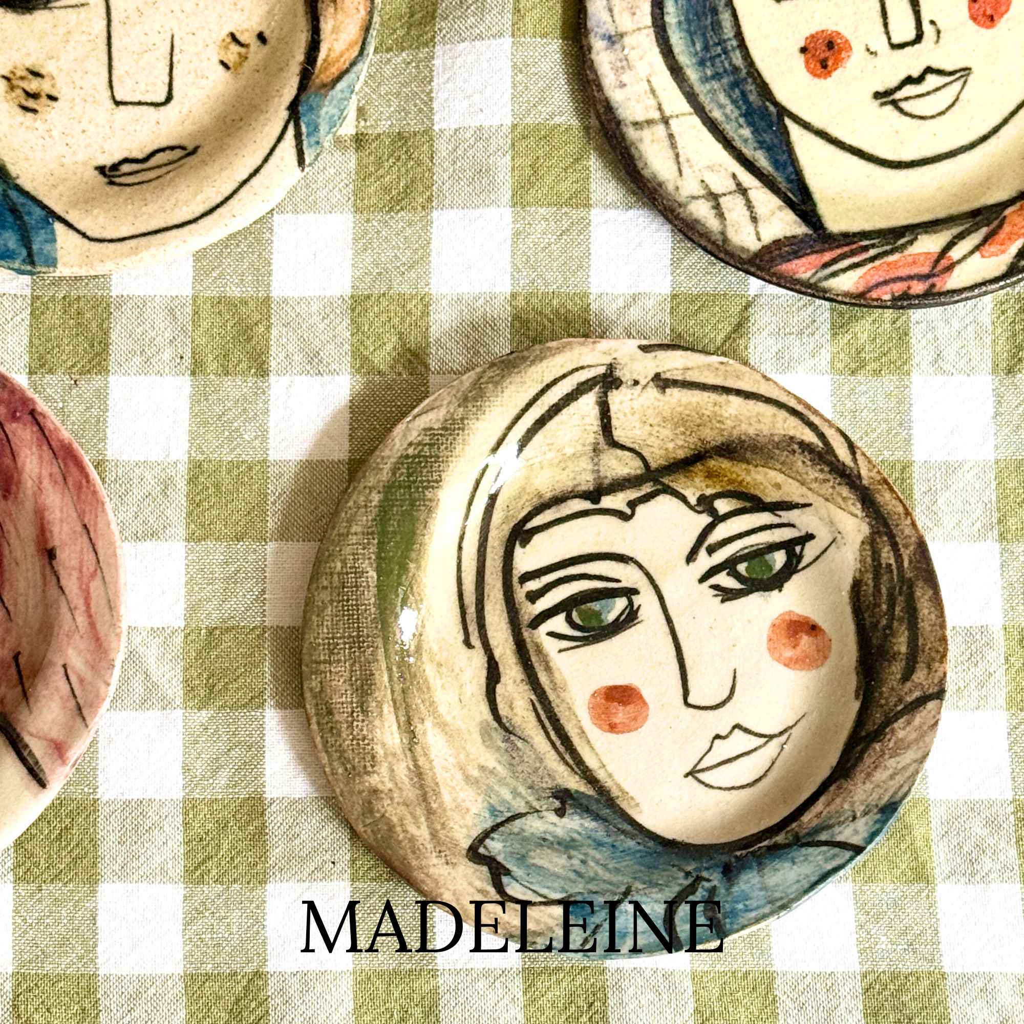 Madeleine, hand-painted plate with a lady's face by E.V.