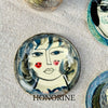 Honorine, hand-painted plate with a lady's face by E.V.