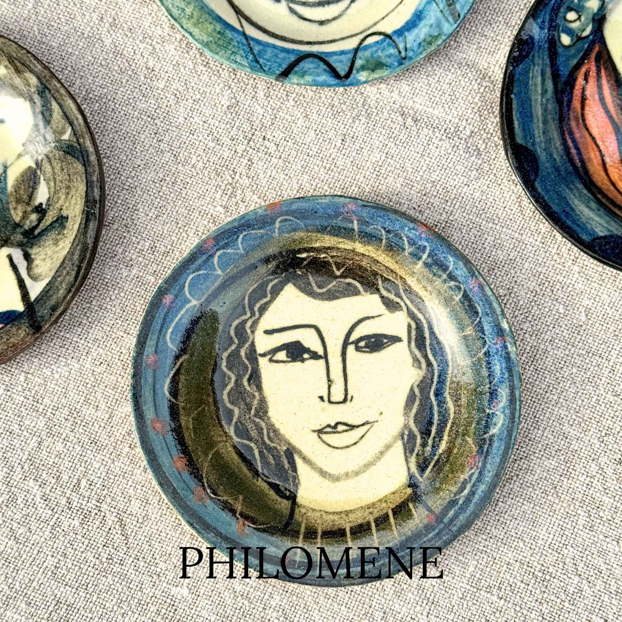 Philomene, hand-painted plate with a lady's face by E.V.