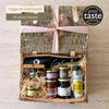 Tariette Lio vegan French food hamper open with red wine, olive oil, vegetable spreads, jam and caramelised almonds.