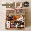 Tariette Manon sweet French hamper open with rosé wine, calissons, nougat, chocolate orangettes, almonds, preserves and caramel lollies.