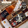 Close-up of the Manon sweet hamper with chocolate almonds, calissons, rosé wine, chocolate spread and citrus jam.