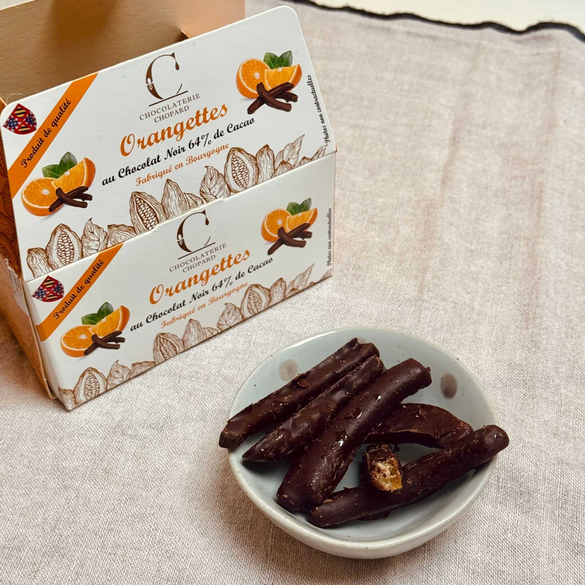 Candied orange peels dipped in smooth dark chocolate. A classic French treat full of citrus zest and cocoa warmth.