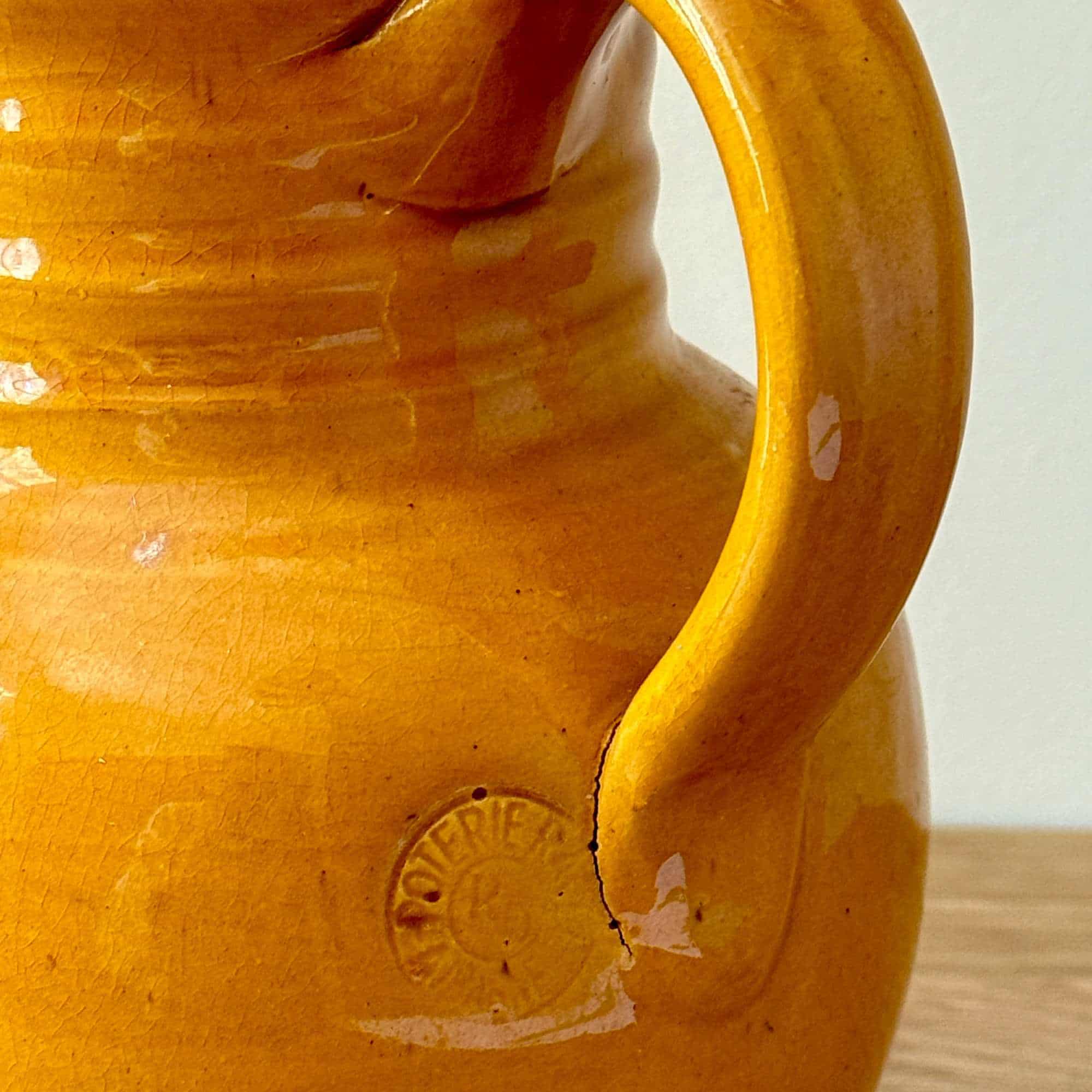 Signed Poterie Ravel Provençal yellow glazed pottery jug