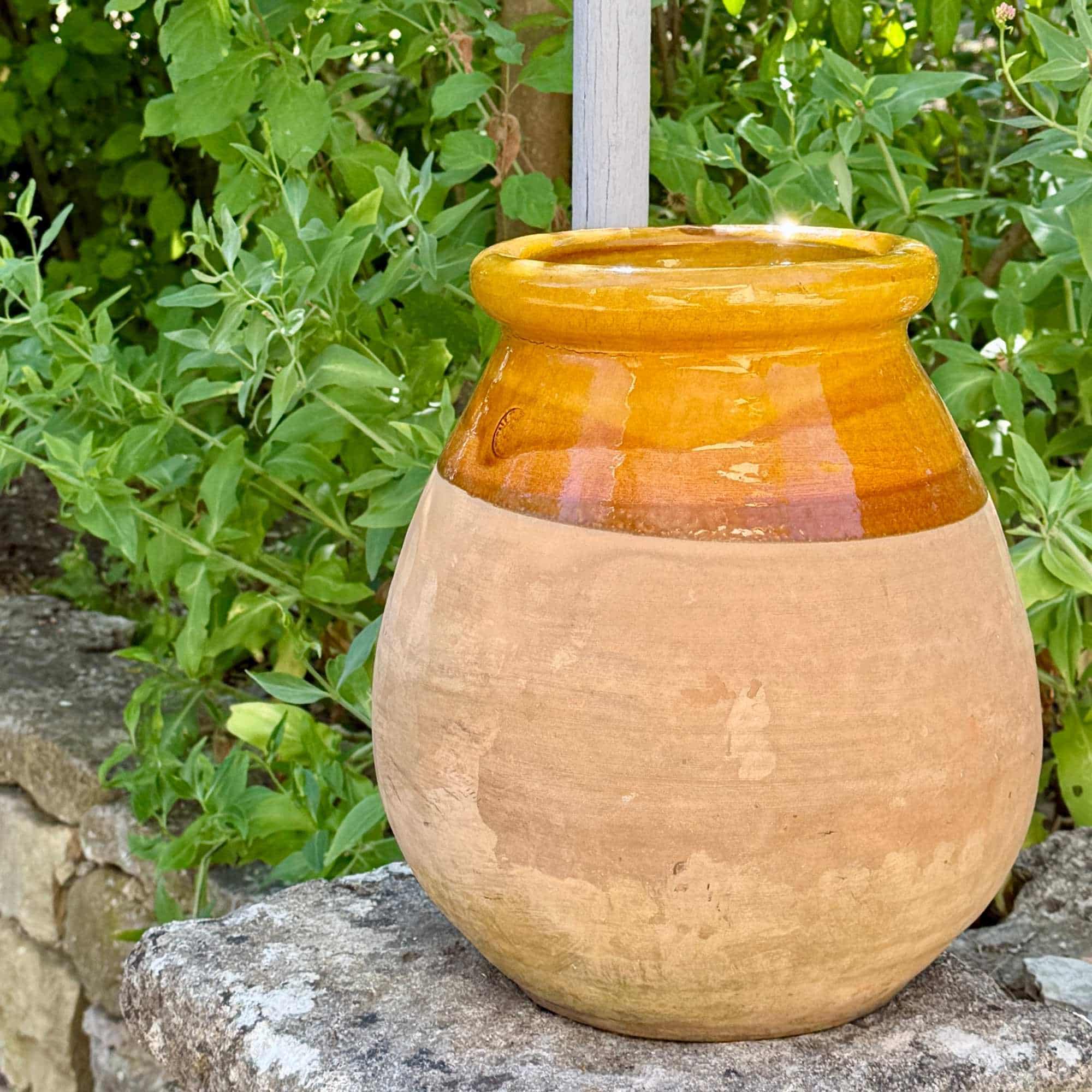 Large French terracotta jar with natural unglazed rounded body