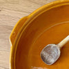 Round French pottery serving dish with two side handles