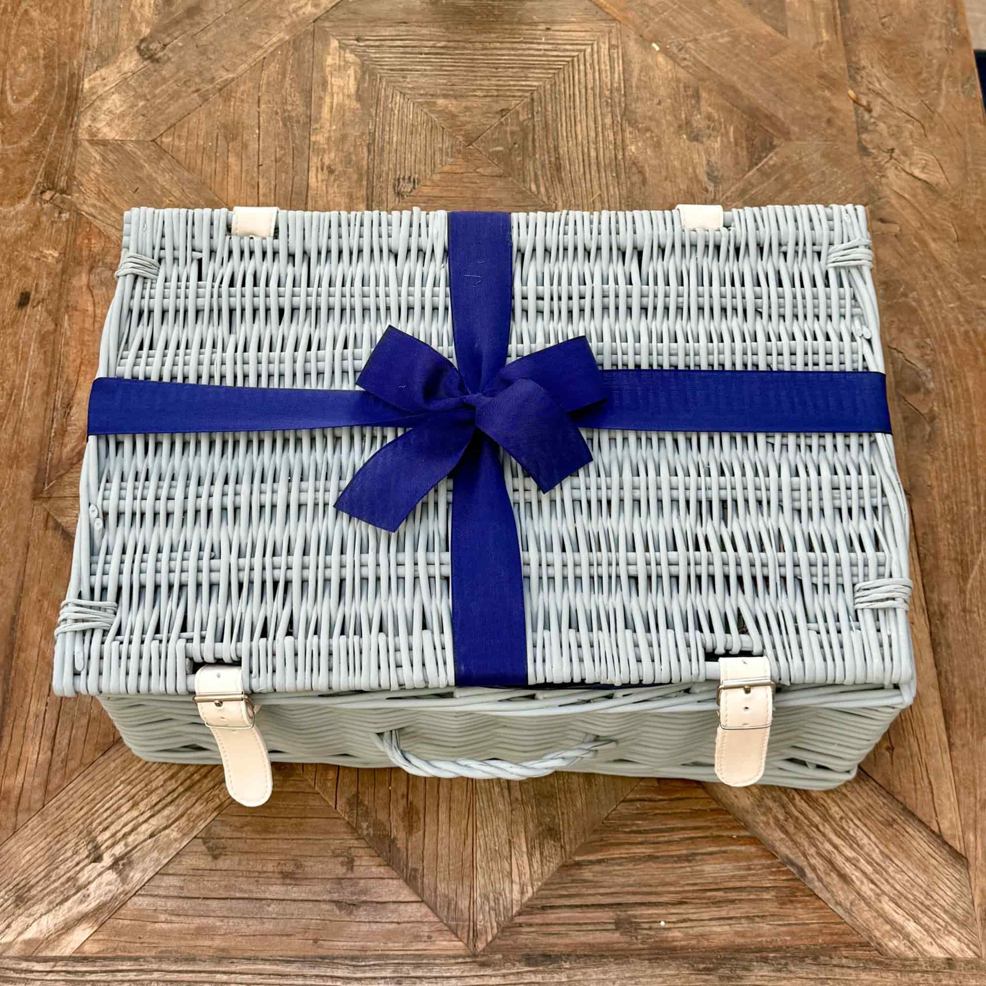 A handsome French hamper, Saturnin offers a feast of savoury delights, fine wines, and indulgent sweets to enjoy together.