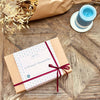 Tariette French sweet shop gift set in kraft gift box with ribbon, styled on rustic wooden table