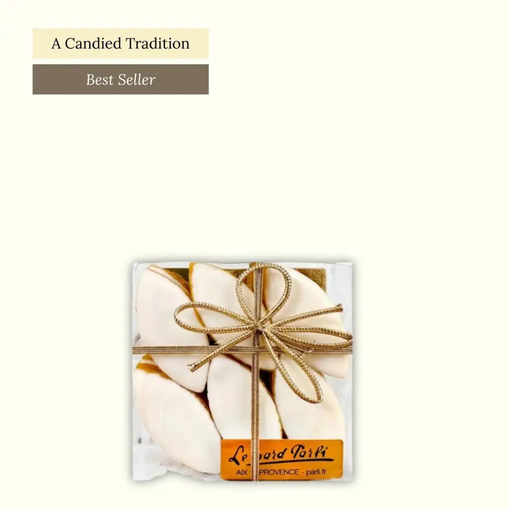 These traditional calissons are a Provençal confectionery made of ground almonds, candied melon, and orange zests, coated with royal icing. Box of 12.