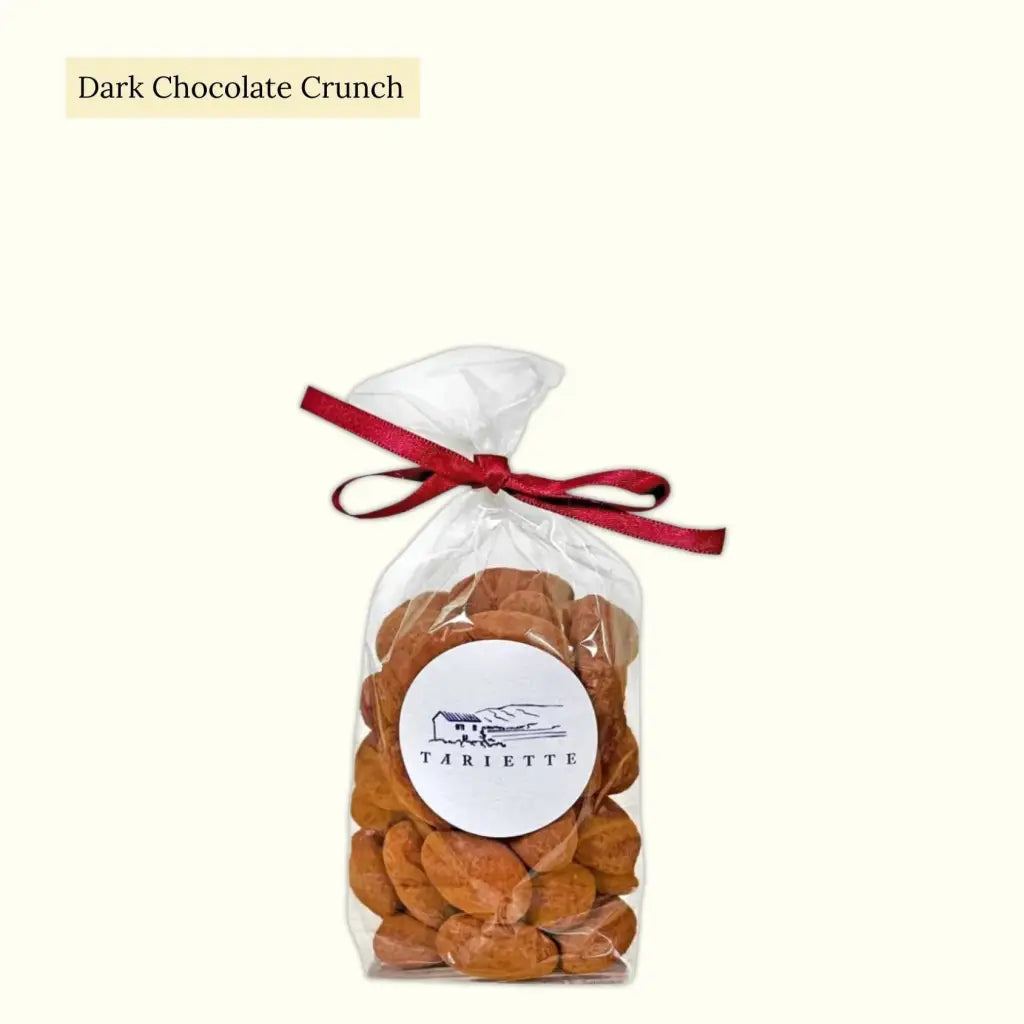 Roasted almonds from Haute-Provence, dipped in dark chocolate and dusted in cocoa powder.