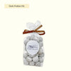 Roasted hazelnuts scented with Bourbon vanilla, coated in milk chocolate and dusted with natural sweetener.