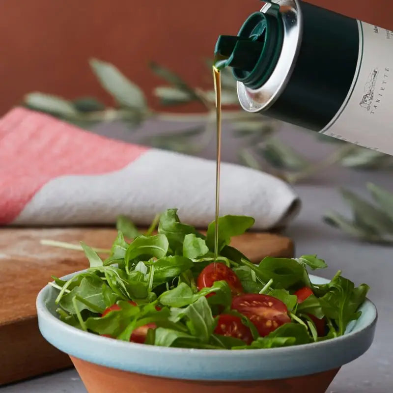 Rocket salad and tomatoes, seasoned with extra virgin olive oil from Provence