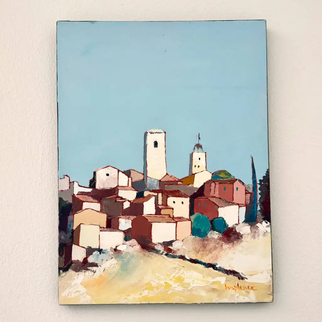 Vibrant vintage oil on canvas depicting the sunlit rooftops and church towers of a Provençal hilltop village under a brilliant blue sky. 