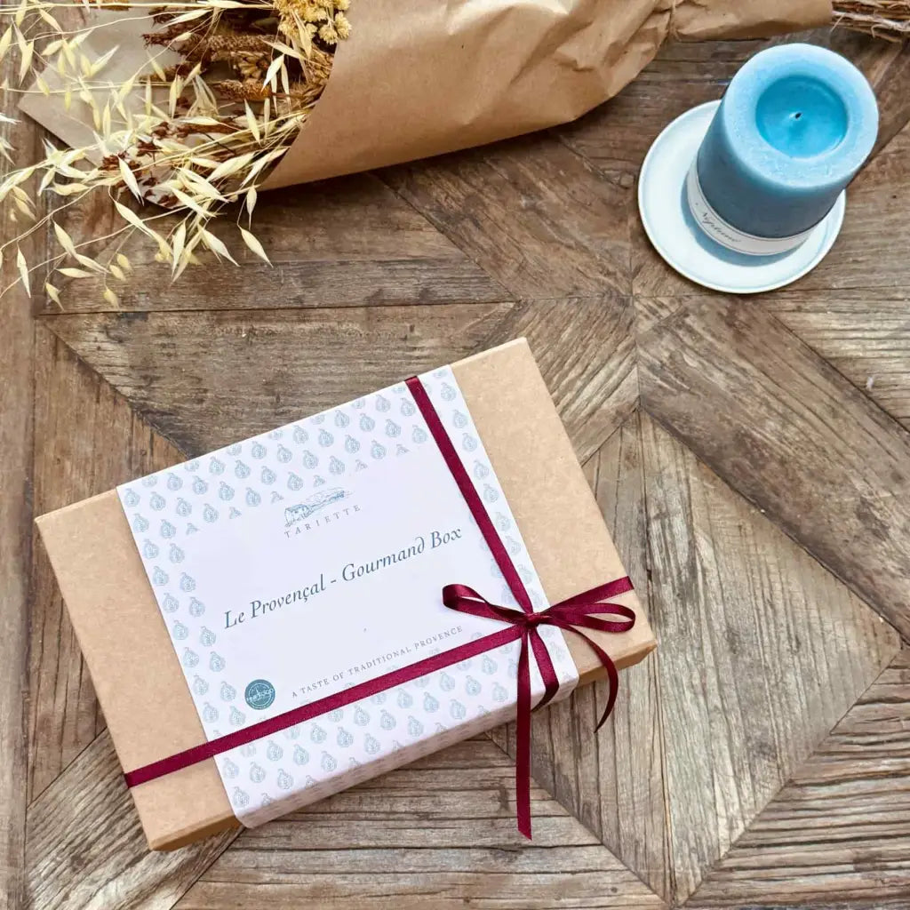 Artisan gift box of Provençal sweets with Calissons, chocolate coated almonds, flower honey, vegan treats and caramel lollies.