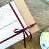 Gift box with Provençal sweet treats including Calissons from Aix, chocolate coated almonds, Provence flower honey, vegan sweets and caramel lollies.
