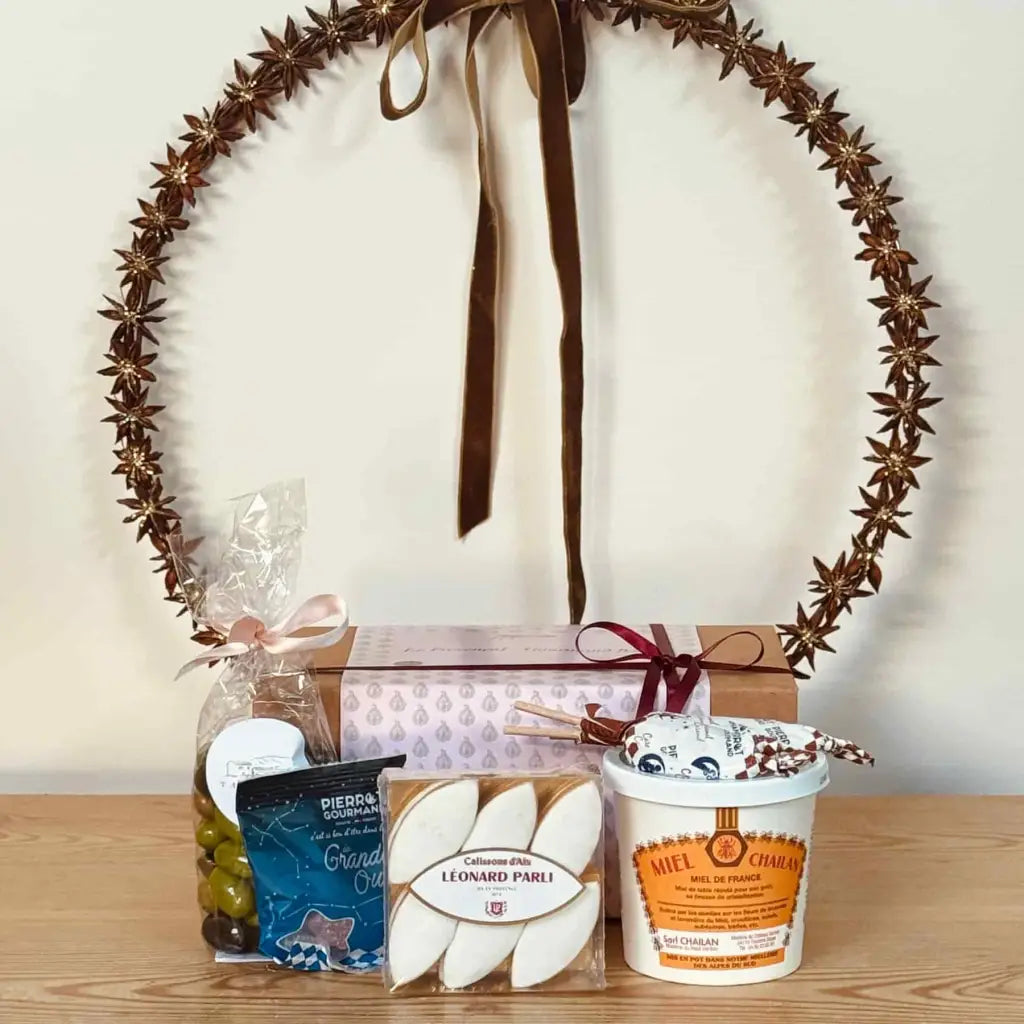 Provence gourmand box featuring Calissons, chocolate almonds, artisan honey, vegan sweets and buttery caramel lollies.