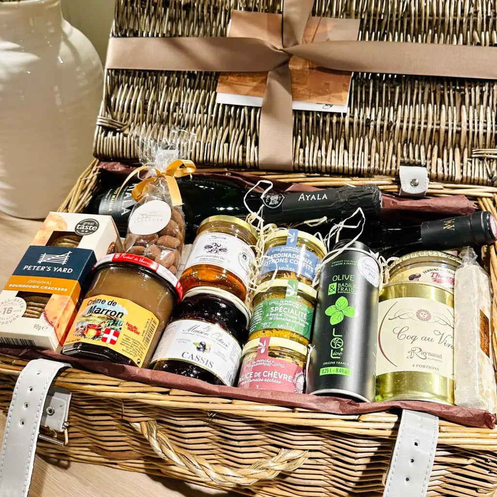 A large hamper with delicious French food and wines
