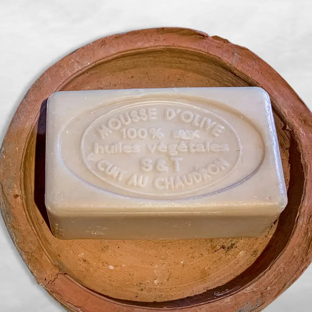 provence soap with olive oil in terracotta dish