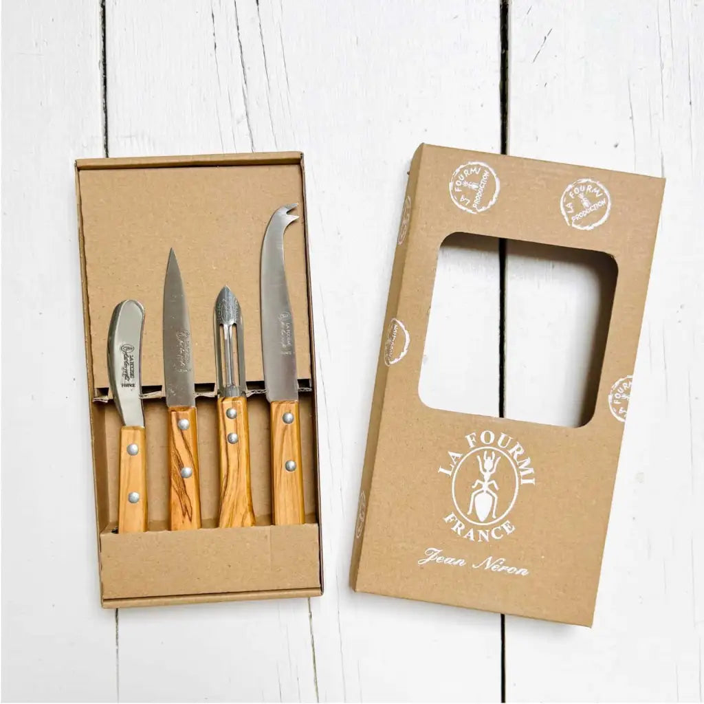 4-piece French knife set for cooking and serving. Includes a cheese knife, paring knife, spreader and peeler. Stainless steel blades and olive wood handles.