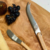 Close up on Laguiole cheese knife and butter knife