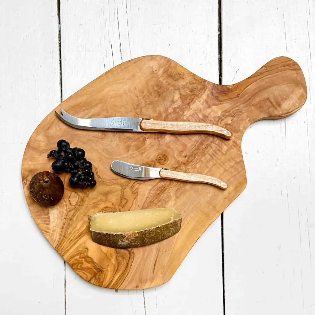 Laguiole Cheese and Butter Knife Set on a cheese board