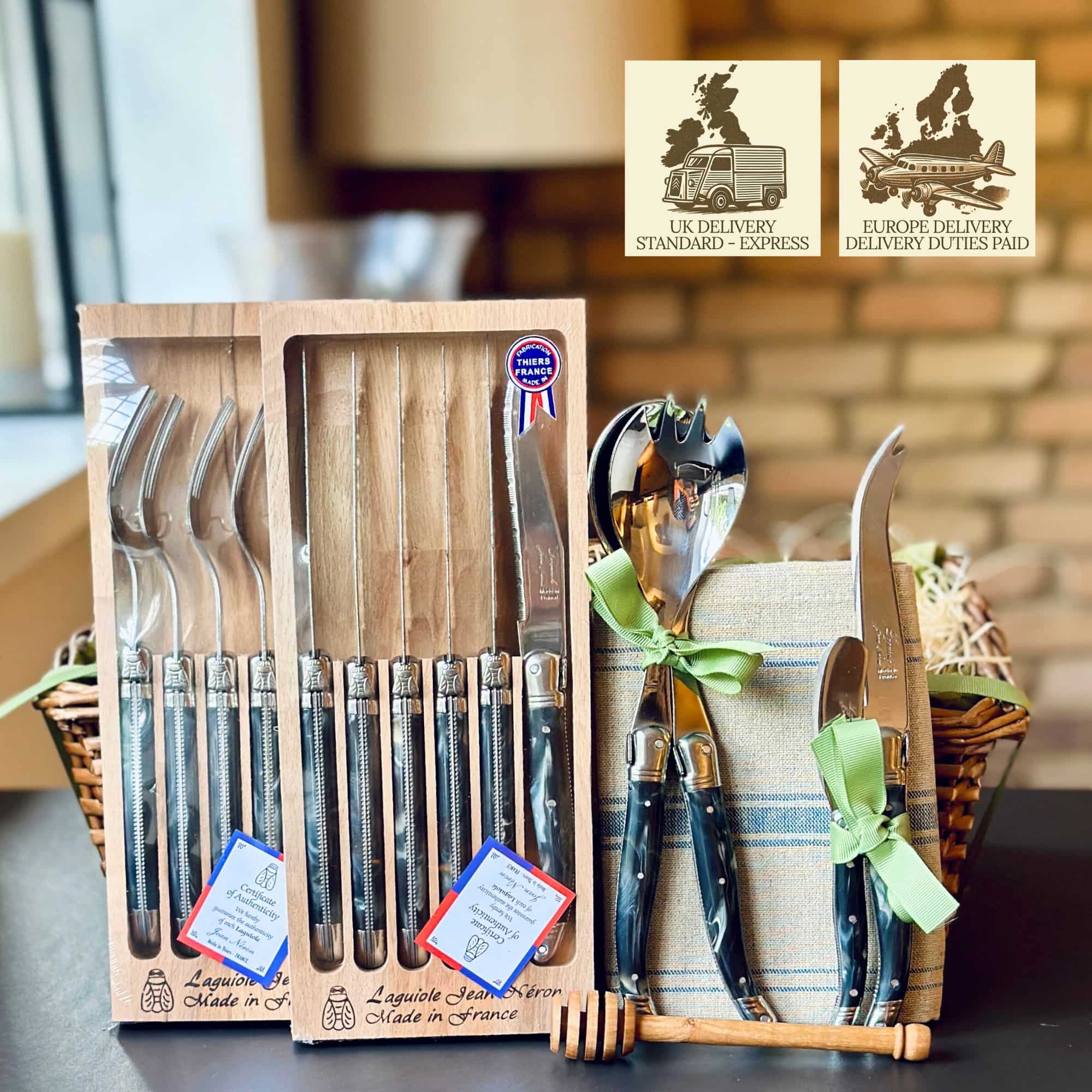 This elegant Laguiole cutlery gift set includes handcrafted stainless steel pieces with ABS handles, matching servers, and two complimentary gifts in a wicker basket.