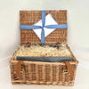 Large wicker hamper with a note