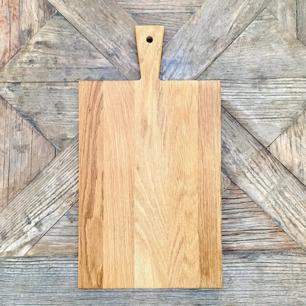 Oak olive wood board on its own