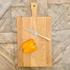 Oak chopping board with paring knife