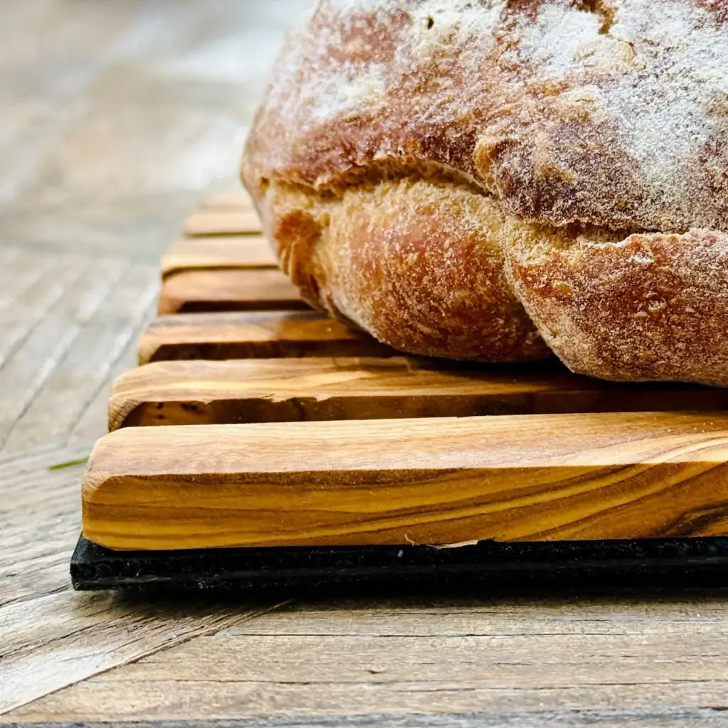 loaf of bread on bread board