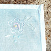 Not new, but in great condition, they have been gently used and well preserved. The embroidery is done in light pastel shades - a pink and yellow flower with pale green leaves - adding a touch of Provençal nostalgia to the set.
