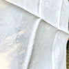 Set of French damask cotton napkins with monogram AE embroidered in an elegant, flowing hand.