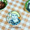 Small plate with painted ladies faces by Elisabeth V. –