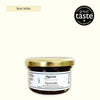 Jar of tapenade with a gold lid on a white background, featuring the 'Great Taste' award logo.
