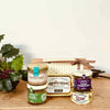 Gourmet savoury gift from Provence including olive tapenade, aubergine spread, venison pâté, duck terrine and sardines in olive oil, presented in a gift box.