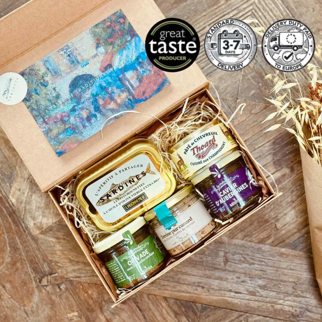 A hearty gift for the savoury palate. This selection brings together green olive tapenade, aubergine spread, venison and mushroom pâté, duck terrine and a tin of tender sardines marinated in extra virgin olive oil. Everything is beautifully presented in a gift box, wrapped with ribbon and bow. A small yet generous gesture, perfect for just over £40. For something sweet instead, have a look at our Provençal Gourmand Box.